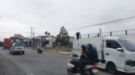 Photo, Nampak Bangunan KDMP Desa Kaliwinasih sudah berdiri kokoh biarpun baru 75% bangunan, berderet dengan Alfa Mart.(Dok.beritafakta.id)